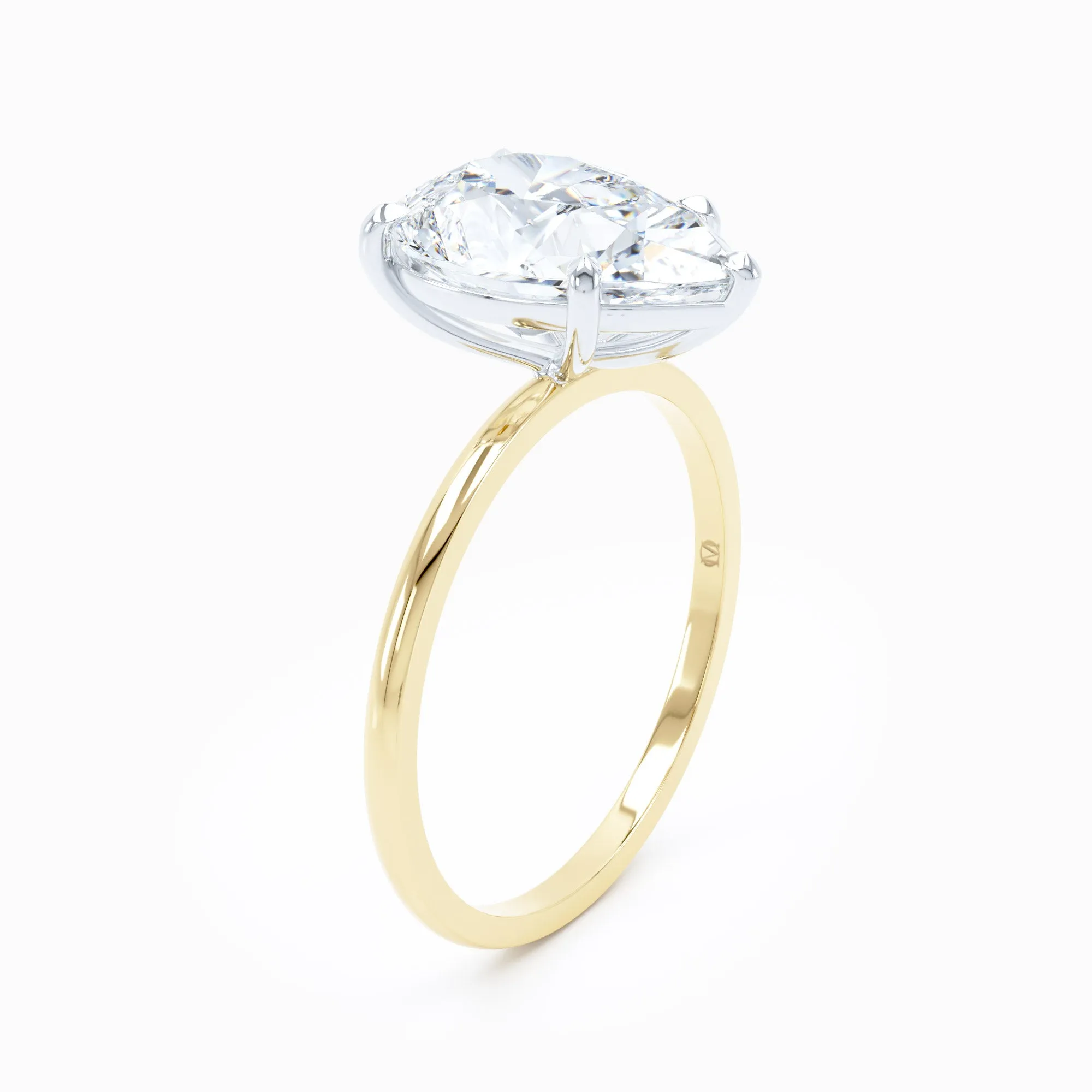 Petite Solitaire - Pear Engagement Ring