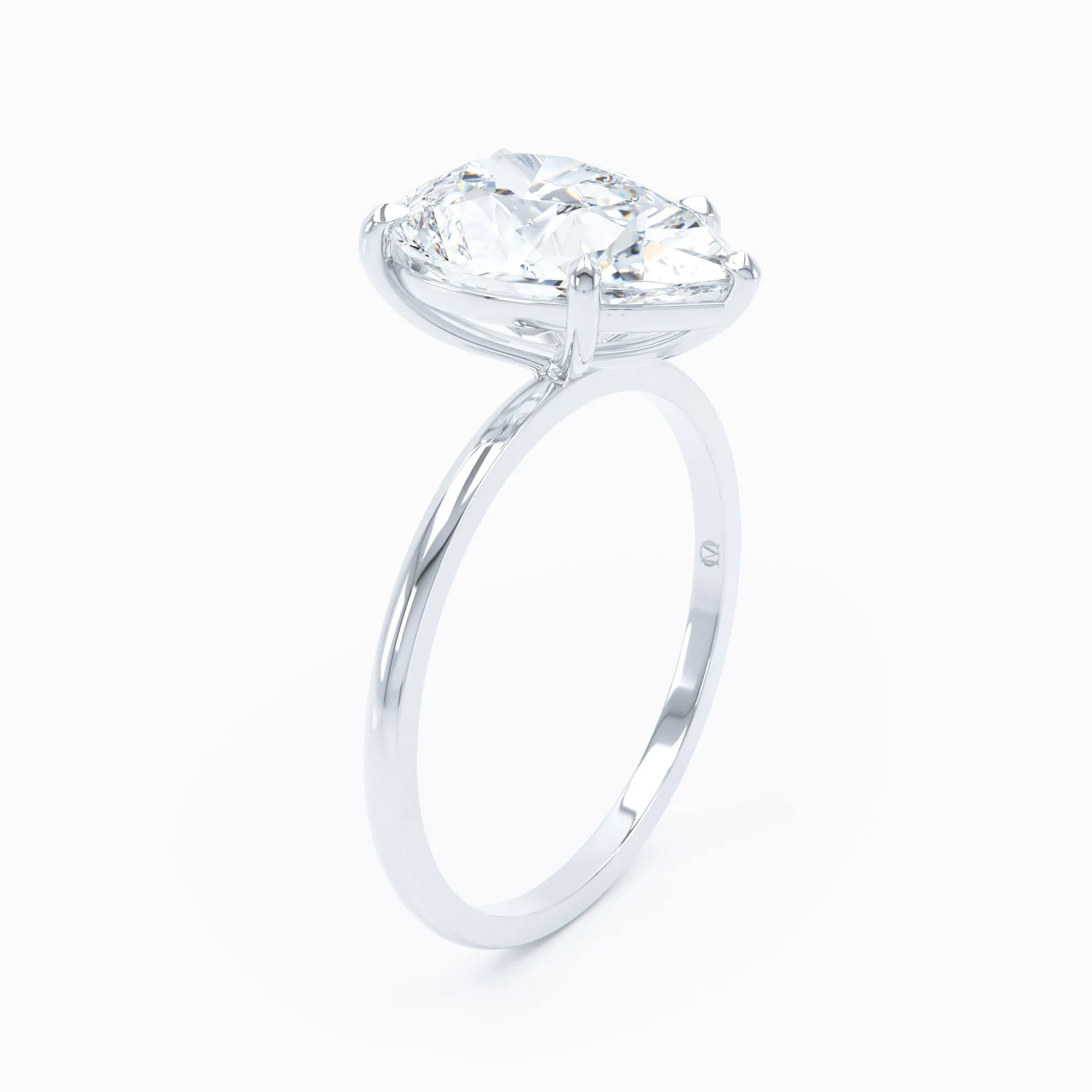 Petite Solitaire - Pear Engagement Ring