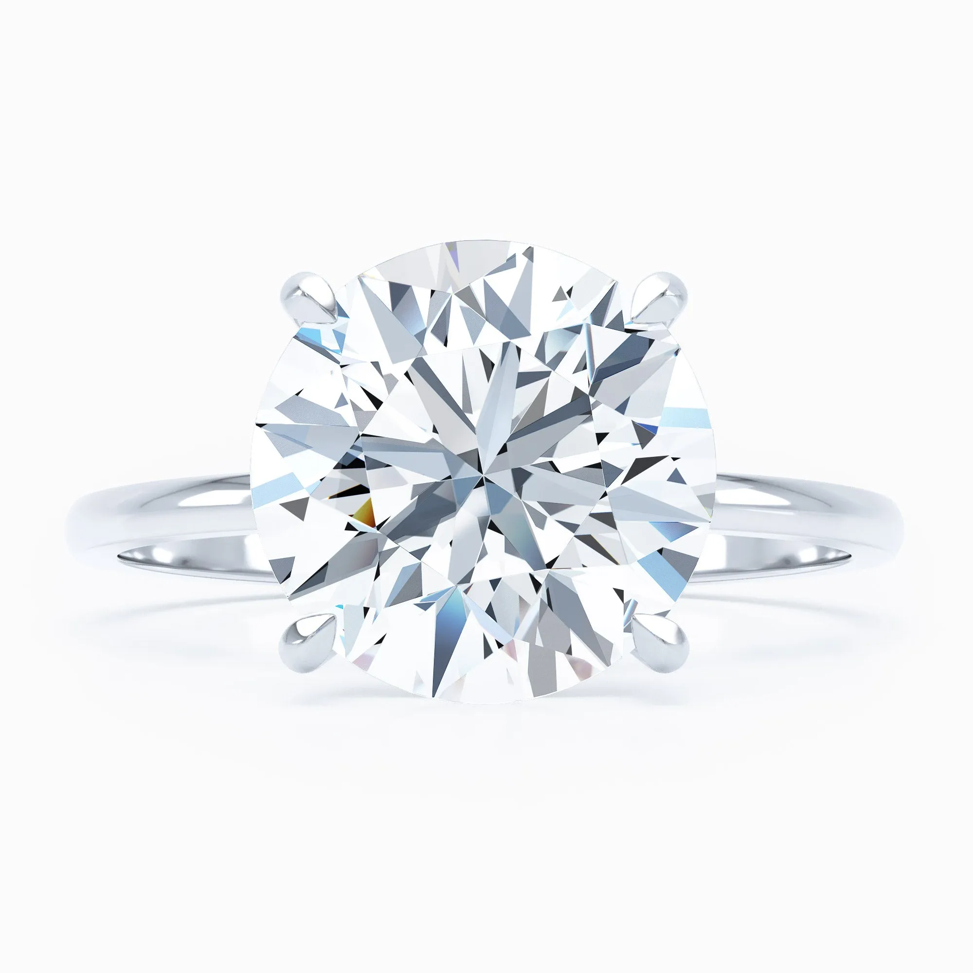 Petite Solitaire - Round Engagement Ring