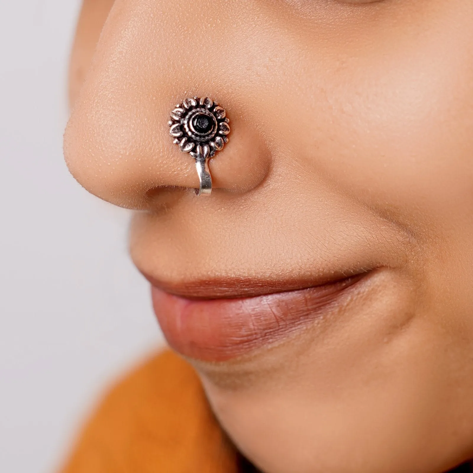 Zia Black Stone Floral Nose pin